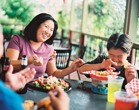 Family eating with Busch Gardens Tampa Bay Annual Pass discount